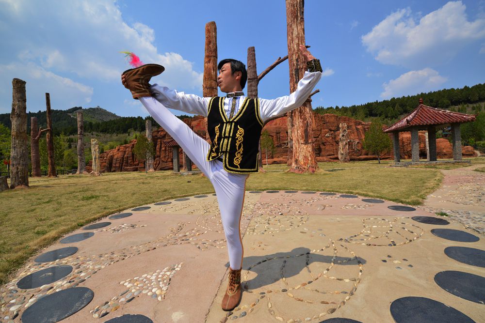 青州花毽招式之"一柱擎天"